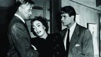 Backdrop to the movie "The Damned Don