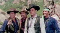 Backdrop to the movie "Four Guns to the Border" #885592
