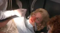 Backdrop to the movie "The Dentist" #894187