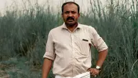 Backdrop to the movie "Ela Veezha Poonchira" #738064