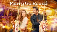 Backdrop to the movie "Marry Go Round" #989532