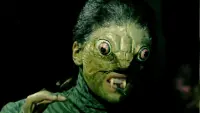 Backdrop to the movie "The Reptile" #698642