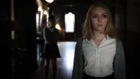 Backdrop to the movie "Down a Dark Hall" #830228