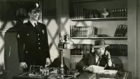 Backdrop to the movie "The Racket Man" #894669
