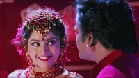 Backdrop to the movie "Muthu" #732201
