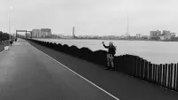 Backdrop to the movie "Do Not Expect Too Much from the End of the World" #515237