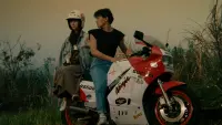Backdrop to the movie "A Moment of Romance" #798432