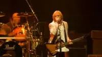 Backdrop to the movie "Tom Petty & the Heartbreakers - High Grass Dogs - Live from the Fillmore" #1145555