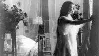 Backdrop to the movie "Twilight of a Woman