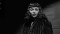 Backdrop to the movie "The Seventh Victim" #707617
