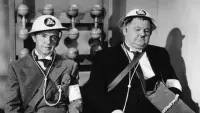Backdrop to the movie "Air Raid Wardens" #698577