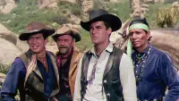 Backdrop to the movie "Four Guns to the Border" #885588