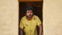 Backdrop to the movie "Aayirathil Oruvan" #716672