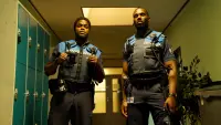 Backdrop to the movie "Almost Cops" #815064