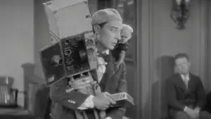 Backdrop to the movie "The Cameraman" #738408