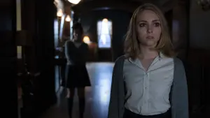 Backdrop to the movie "Down a Dark Hall" #470783