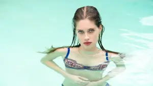 Backdrop to the movie "The Girl in the Pool" #705523