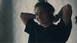 Backdrop to the movie "Room 203" #412460