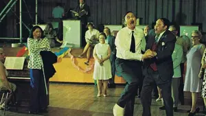 Backdrop to the movie "Holiday on the Buses" #484058