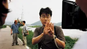 Backdrop to the movie "Memories of Murder" #630474