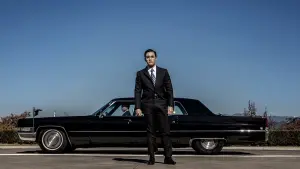 Backdrop to the movie "The Man Standing Next" #372013