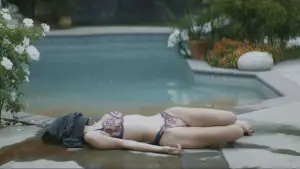 Backdrop to the movie "The Girl in the Pool" #705526