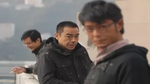 Backdrop to the movie "Overheard" #411730