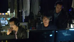 Backdrop to the movie "Overheard" #411733