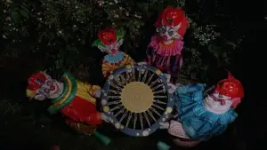 Backdrop to the movie "Killer Klowns from Outer Space" #878401