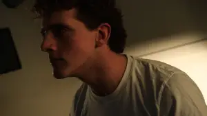 Backdrop to the movie "J