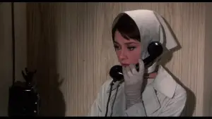 Backdrop to the movie "Charade" #723070