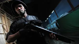 Backdrop to the movie "The Raid" #217713