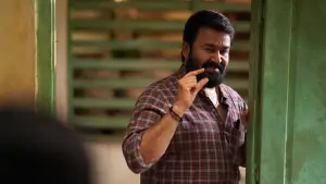 Backdrop to the movie "Thudarum" #719807