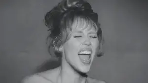 Backdrop to the movie "Miley Cyrus: Something Beautiful" #713923