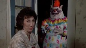Backdrop to the movie "Killer Klowns from Outer Space" #878411