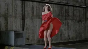 Backdrop to the movie "The Woman in Red" #805655