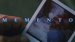 Backdrop to the movie "Memento" #587138