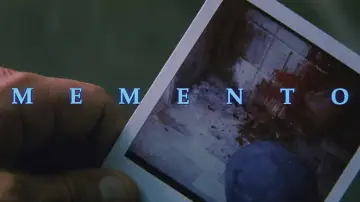 Backdrop to the movie "Memento" #587138