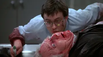 Backdrop to the movie "Re-Animator" #875491