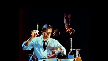 Backdrop to the movie "Re-Animator" #875497