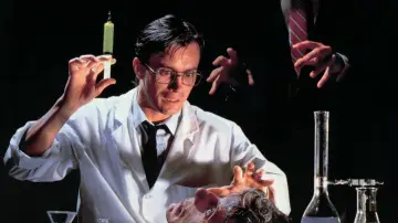 Backdrop to the movie "Re-Animator" #875548