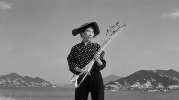 Backdrop to the movie "The Naked Island" #1635246