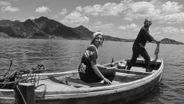 Backdrop to the movie "The Naked Island" #1635260