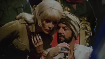 Backdrop to the movie "Ilsa: Harem Keeper of the Oil Sheiks" #1848374