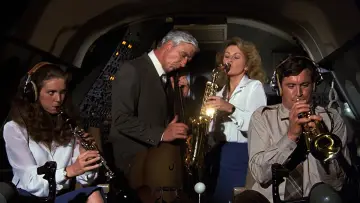 Backdrop to the movie "Airplane!" #639549