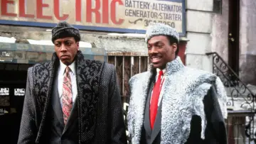 Backdrop to the movie "Coming to America" #1799080