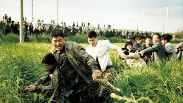 Backdrop to the movie "Memories of Murder" #1825394