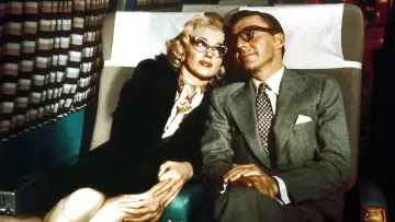 Backdrop to the movie "How to Marry a Millionaire" #905742