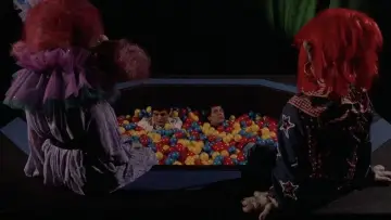 Backdrop to the movie "Killer Klowns from Outer Space" #878405