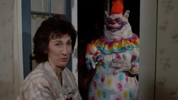 Backdrop to the movie "Killer Klowns from Outer Space" #878411